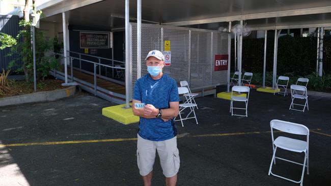 Melbourne tourist Robert Rudolph getting his day five Covid test at a fairly quiet Cairns Hospital testing facility on Thursday, December 23.