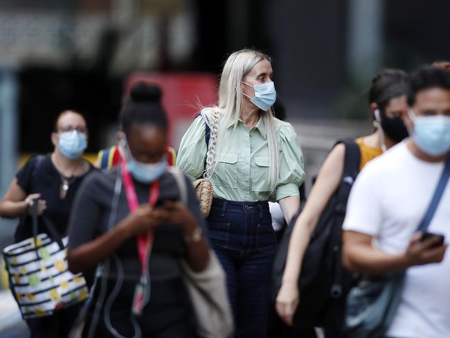 Pedestrians pictured at Central strain station after 5pm when mask wearing became mandatory, Brisbane 29th of March 2021.  Due to a cluster of Covid-19 cases, greater Brisbane goes into a three day lock down from 5pm today.  (Image/Josh Woning)