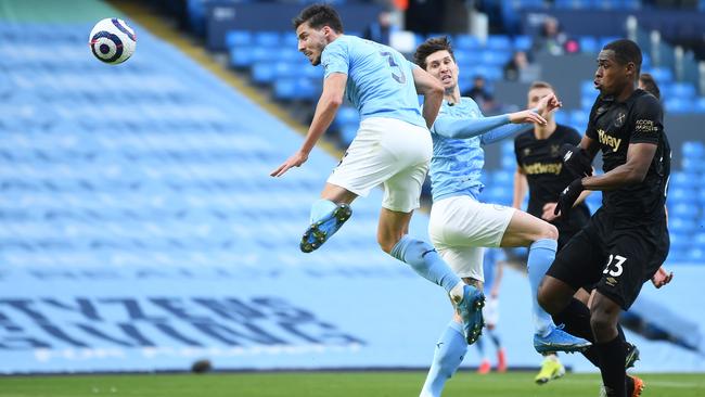 Centre-back Ruben Dias scores for Manchester City against West Ham