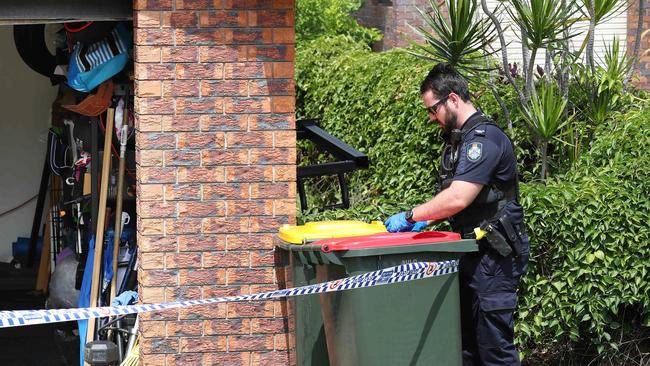 Police cordon off the house of Rowan Baxter. Picture: Liam Kidston