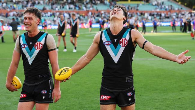 Port Adelaide’s Zak Butters (left) and Connor Rozee celebrate their Round 1 win against West Coast at Adelaide Oval. Picture: James Elsby/AFL Photos via Getty Images