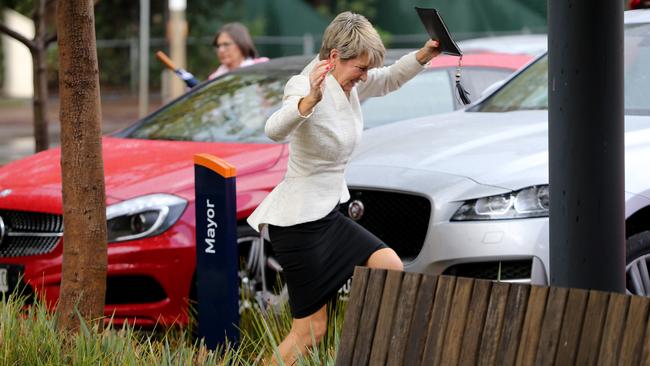 With skills honed as foreign minister in tackling thorny issues, Julie Bishop makes her way through the undergrowth during a visit to Adelaide yesterday. Picture: AAP. 