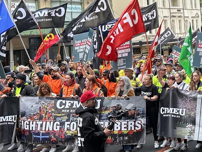 CFMEU workers march in Sydney on October 26, 2023, demanding a ban on engineered stone products. The march comes one day before health ministers meet to consider a ban on the common household products, which has been shown to pose health risks to stone masons. Picture: Supplied