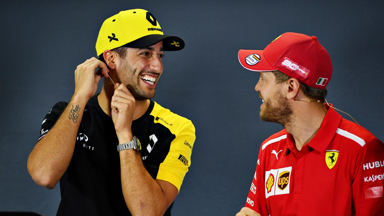 Hey Seb, can I drive your Ferrari? (Photo by Clive Mason/Getty Images)