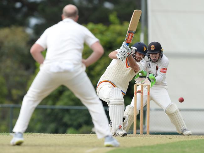 Frankston Peninsula batsman Dale Elmi cracks a delivery from St Kilda’s Michael Beer. Picture:Chris Eastman/AAP