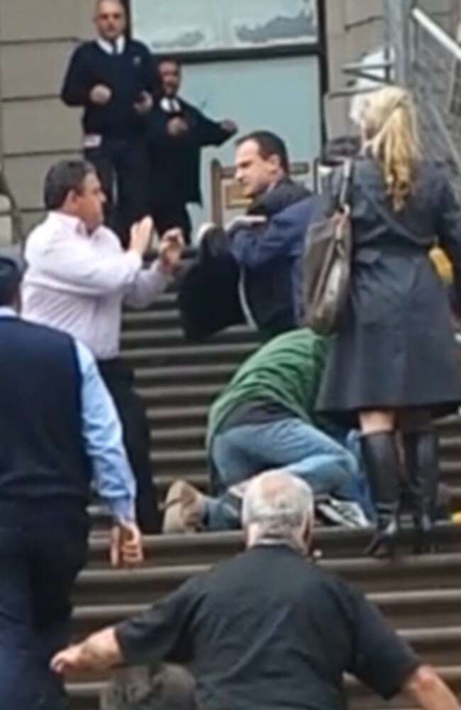 Video stills of the moment Frankston MP Geoff Shaw was involved in a brawl with taxi protesters.