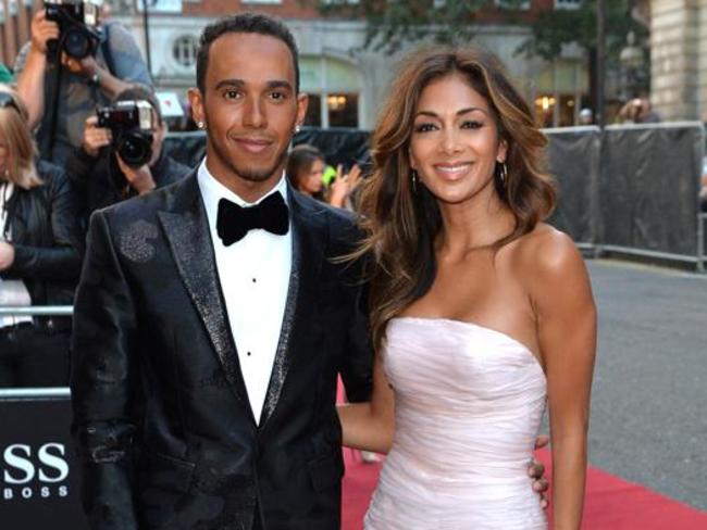 Lewis Hamilton and Nicole Scherzinger attended the GQ Men of the Year awards at The Royal Opera House on September 2, 2014 in London, England. Picture: AP.