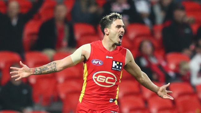 Izak Rankine celebrates a goal during the Gold Coast Suns' Round 10 game against St Kilda at Metricon Stadium. Picture: Chris Hyde/Getty Images.