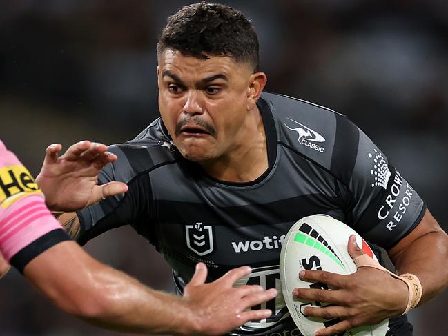 SYDNEY, AUSTRALIA - APRIL 20:  Latrell Mitchell of the Rabbitohs is tackled during the round eight NRL match between South Sydney Rabbitohs and Penrith Panthers at Accor Stadium on April 20, 2023 in Sydney, Australia. (Photo by Cameron Spencer/Getty Images)