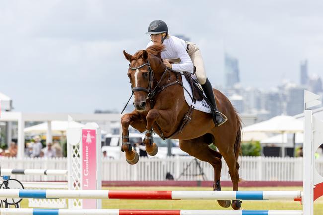 Ally Mowley competing in the Magic Millions Showjumping and Polo. Picture by Luke Marsden.