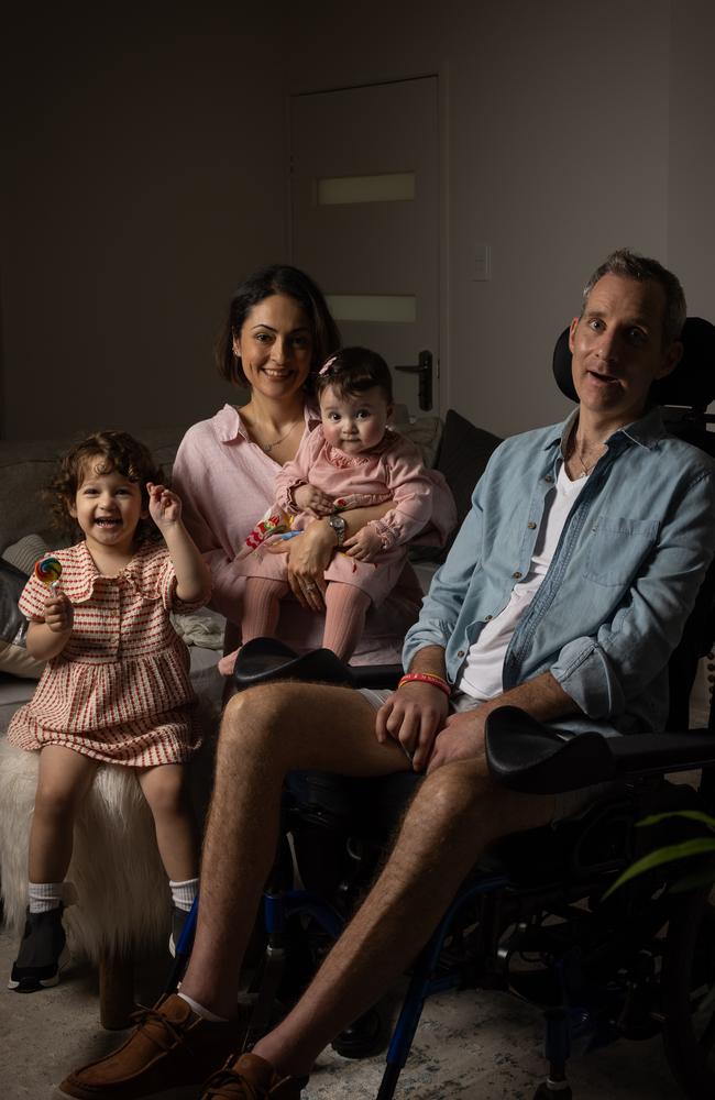 Johnny McCowen, who has ALS the most aggressive form of motor neurone disease, with his wife Sherie and two daughters two year old Darcy and 11 month old Riley. Picture: David Kelly.