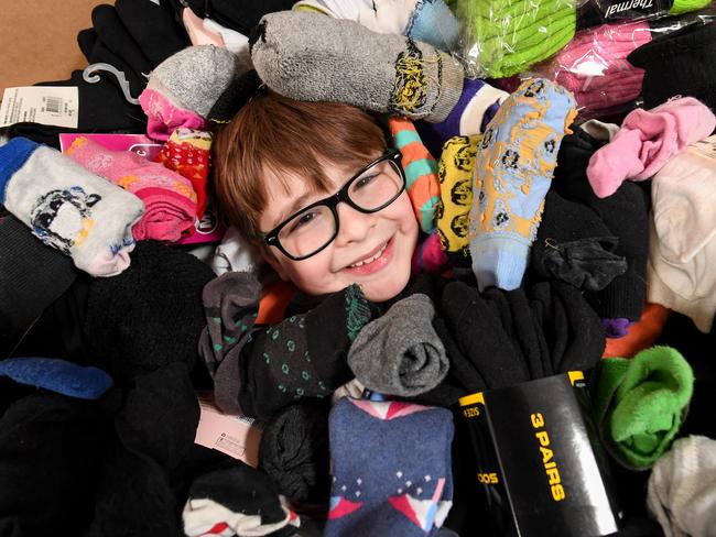 Benjy drowning in his 2836 socks. Picture: Penny Stephens.