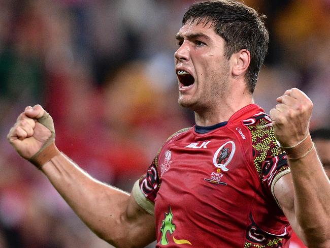 BRISBANE, AUSTRALIA - MAY 30: Rob Simmons of the Reds celebrates victory after the round 16 Super Rugby match between the Reds and the Highlanders at Suncorp Stadium on May 30, 2014 in Brisbane, Australia. (Photo by Bradley Kanaris/Getty Images)