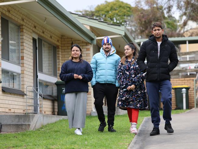 Apsara Subedi, Bipin Paudel, Sadikshya Aryal and Arjun Kunwar outside their unit in Bedford Park. They all suffered Carbon monoxide poising after burning coals inside their home to keep warm. NCA NewsWire / David Mariuz