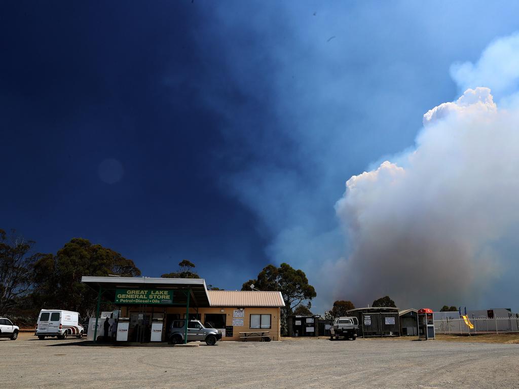 Smoke intensifies behind the Great Lakes Store. Picture: LUKE BOWDEN