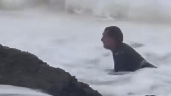 Australian surfer Joel Parkinson shares video of him losing his wedding ring in rough surf on the Gold Coast