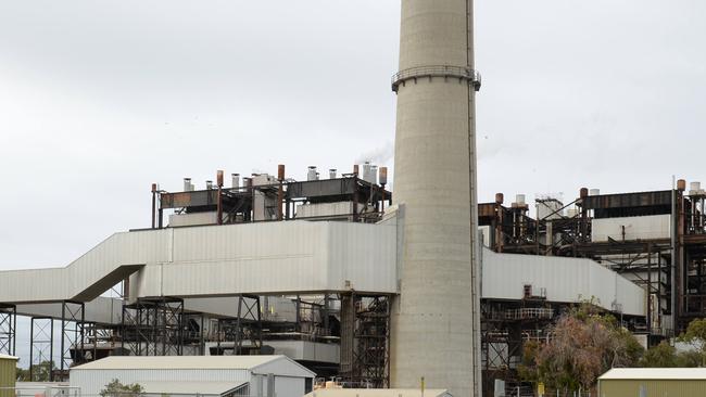 In front of one of the power stacks at the Torrens Island Power Station. Picture: File