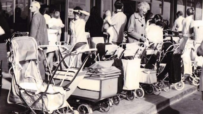 Prams lined up outside Kmart as shoppers headed inside.