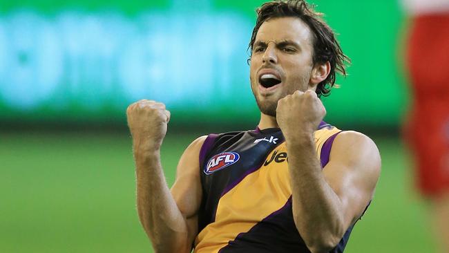 Sam Lloyd kicks the winning goal against Sydney. Picture: Wayne Ludbey