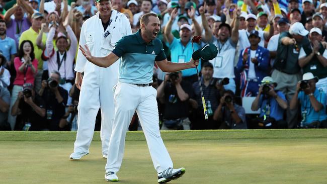 AUGUSTA, GA — APRIL 09: Sergio Garcia of Spain and caddie Glen Murray celebrate after defeating Justin Rose (not pictured) of England on the first playoff hole during the final round of the 2017 Masters Tournament at Augusta National Golf Club on April 9, 2017 in Augusta, Georgia. (Photo by David Cannon/Getty Images)