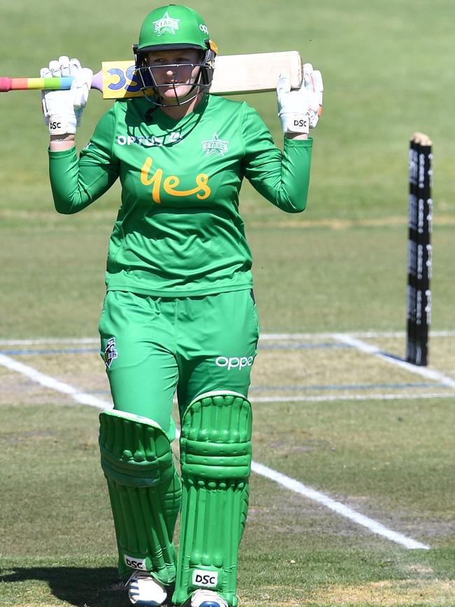 Stars opening batter Lizelle Lee walks from the field after being dismissed for six runs leg-before by Sophie Devine. Picture: AAP IMAGE/DAVID MARIUZ