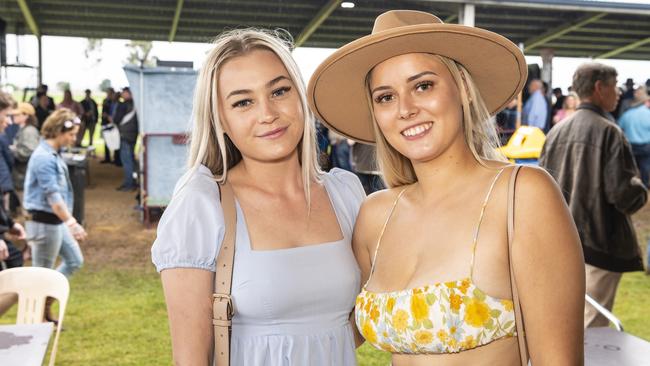 Makayla Rudd (left) and Paige Bazant at the Clifton Cup races hosted by Clifton Jockey Club, Saturday, October 22, 2022. Picture: Kevin Farmer