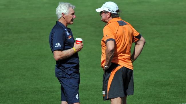 Coaching contemporaries Mick Malthouse (left) and Kevin Sheedy are among those that have reached out to Walls. (AAP Image/Paul Miller)