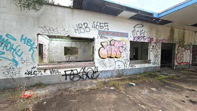 A car wanted in connection with the deadly hit on Jason Reker was found behind this abandoned building on Bauple Woolooga Road, Bauple on Monday afternoon after the discovery of Mr Reker’s body, police said.