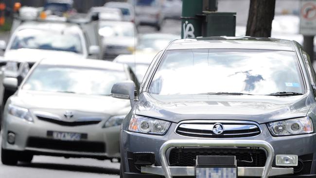 A hidden speed camera in use on Queens Road, Melbourne. Picture: Julian Smith/AAP