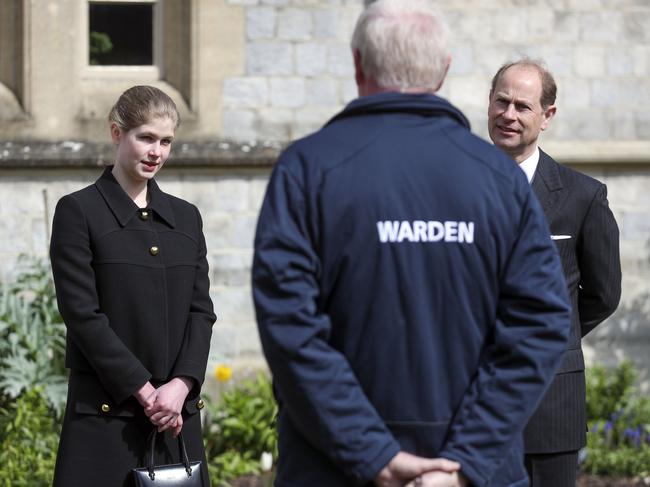 Prince Edward and Lady Louise talk to staff at Windsor where Prince Philip died on Friday. Picture: Getty Images