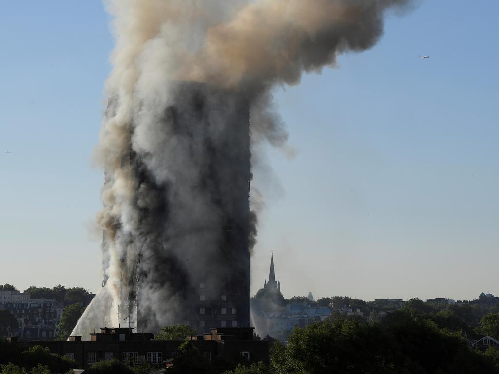 The large billow of smoke from the fire is widely visible on the London skyline. Picture: Reuters/Toby Melville