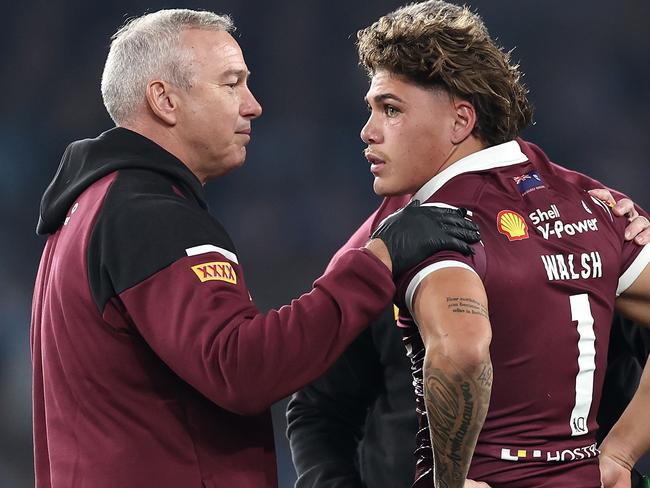 SYDNEY, AUSTRALIA - JUNE 05:  Reece Walsh of the Maroons is attended to by medical staff after been tackled by Joseph-Aukuso Sua'ali'i of the Blues during game one of the 2024 Men's State of Origin Series between New South Wales Blues and Queensland Maroons at Accor Stadium on June 05, 2024 in Sydney, Australia. (Photo by Cameron Spencer/Getty Images)