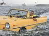 Jason Fischer, Operations Manager and Head Mechanic at Gosford Classic Car Museum , drives the 1966 Amphicar 770, the only commercially successful vehicle in the world that went from land to water, from Rose Bay boat ramp. Picture: Dylan Robinson