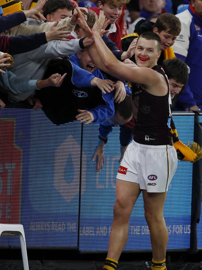 Ginnivan celebrates his goal with Hawthorn fans. Picture: Michael Klein