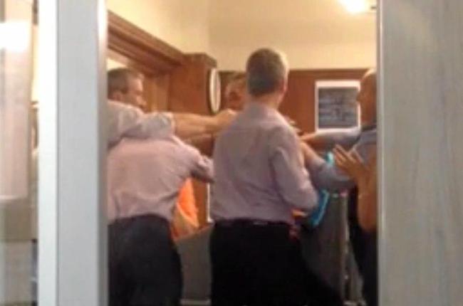 Scenes from video footage taken from the May 31, 2016 incident at Gym[pie Regional Council&#39;s Mary St office. Picture: Contributed