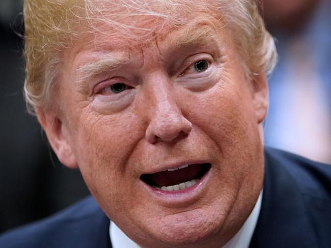 US President Donald Trump speaks during a meeting with state and local officials on school safety in the Roosevelt Room of the White House on February 22, 2018 in Washington, DC.  / AFP PHOTO / MANDEL NGAN