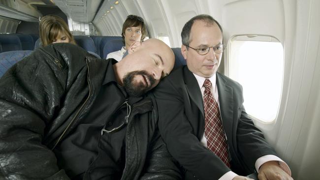 Avoid sleeping with your head on your seatmate's shoulder. Picture: Thinkstock