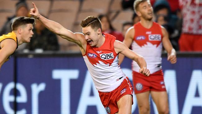 Ben Ronke celebrates a goal against Hawthorn.