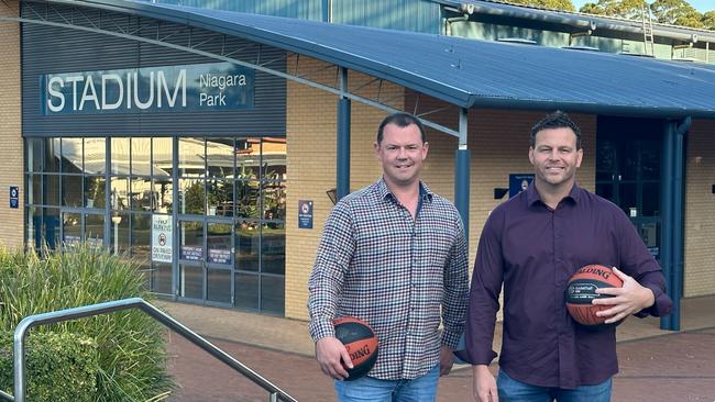 Wyong Leagues Group CEO Ben Coghlan (left) and Central Coast Waves Basketball operations manager Matt Smith at Niagara Park Stadium after the leagues club agreed to buy the struggling association out of liquidation. Picture: Wyong Leagues Club