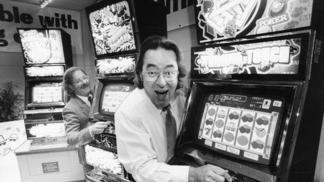 The Booze Brothers, Adrian and Leon Saturno, look at poker machines at the Macmont Gaming Supplies showroom in 1994.