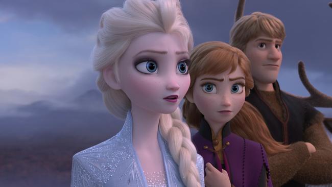 This image released by Disney shows Elsa, voiced by Idina Menzel, from left, Anna, voiced by Kristen Bell, Kristoff, voiced by Jonathan Groff and Sven in a scene from the animated film, "Frozen 2." On Monday, Dec. 9, 2019, the film was nominated for a Golden Globe for best animated film. (Disney via AP)