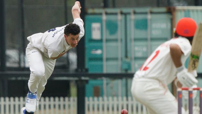 Tyler Pearson bowls for the Hawks. Picture: Valeriu Campan