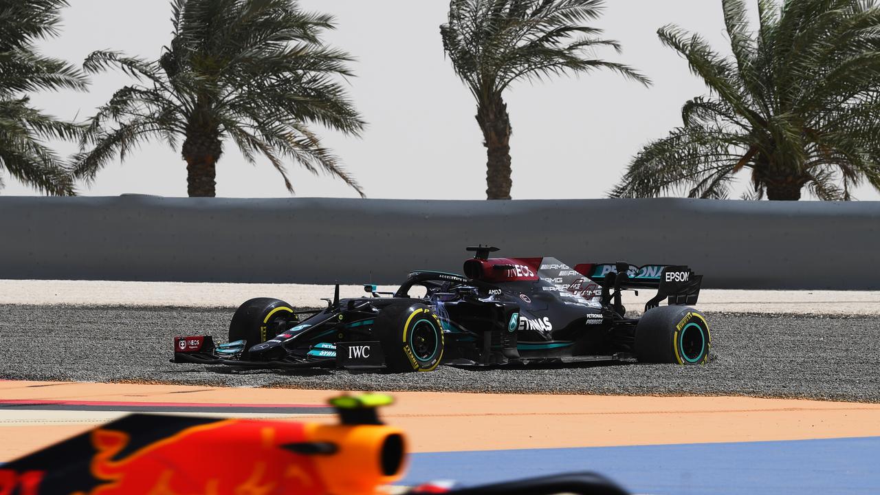 Lewis Hamilton stops in the gravel leading to a red flag. (Photo by Clive Mason/Getty Images)