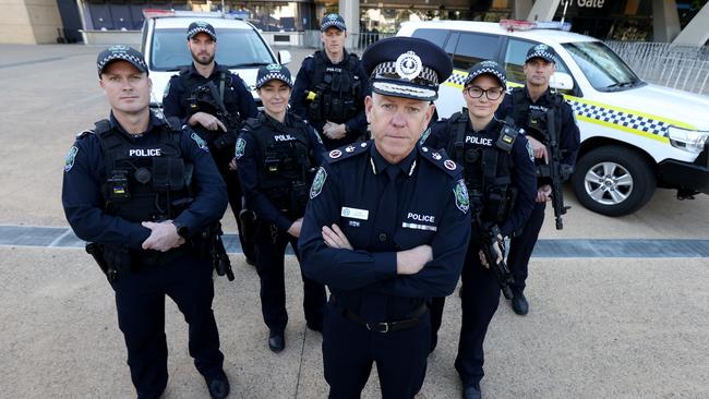 Commissioner Grant Stevens poses for a portrait with the new Security Response Section officers. Picture: NCA NewsWire/Kelly Barnes