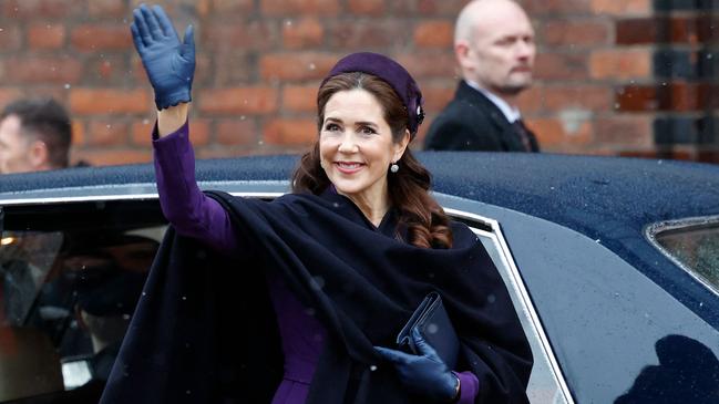 Queen Mary of Denmark waves as she arrives for a church service on the occasion of the change of throne in Denmark, in front of Aarhus Cathedral, Aarhus, Denmark on January 21, 2024. Its the first public appearance in Jutland by Denmark's new King and Queen since the change of throne one week ago. (Photo by Mikkel Berg Pedersen / Ritzau Scanpix / AFP) / Denmark OUT