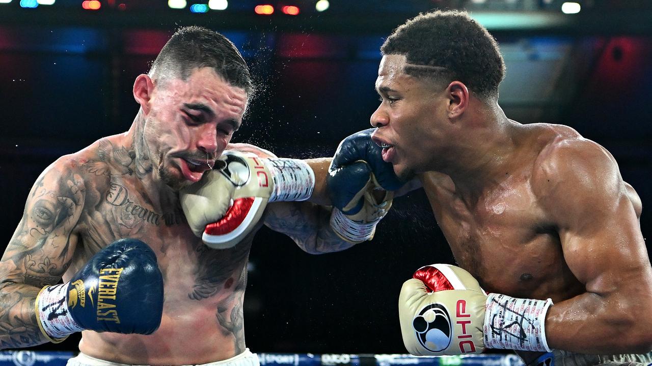 MELBOURNE, AUSTRALIA - JUNE 05: Devin Haney of the United States lands a punch to George Kambosos Jr of Australia during the World Lightweight Championship bout between George Kambosos Jr. of Australia and Devin Haney of the United States at Marvel Stadium on June 05, 2022 in Melbourne, Australia. (Photo by Quinn Rooney/Getty Images)