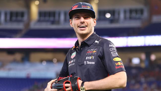 F1 driver Max Verstappen laughs prior to the game between the Miami Marlins and the Arizona Diamond