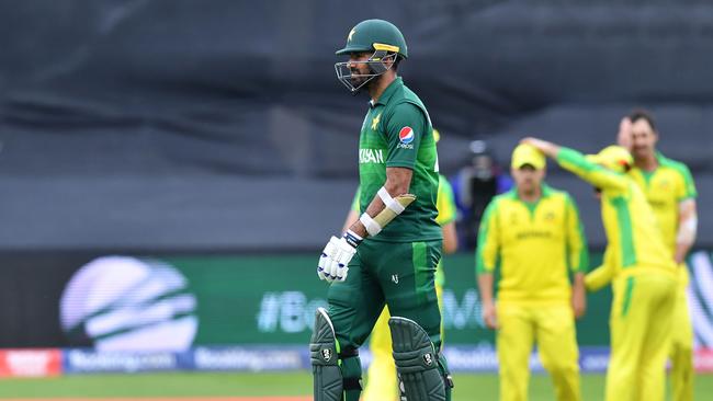 Pakistan's Wahab Riaz trudges back after Aaron Finch’s successful referral. Picture: AFP