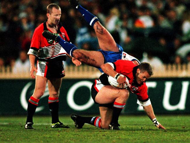 Billy Moore evading tackle for North Sydney.