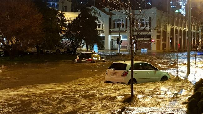 Argyle St and Macquarie St flooded in Hobart. Picture: GEORGE VICKERS